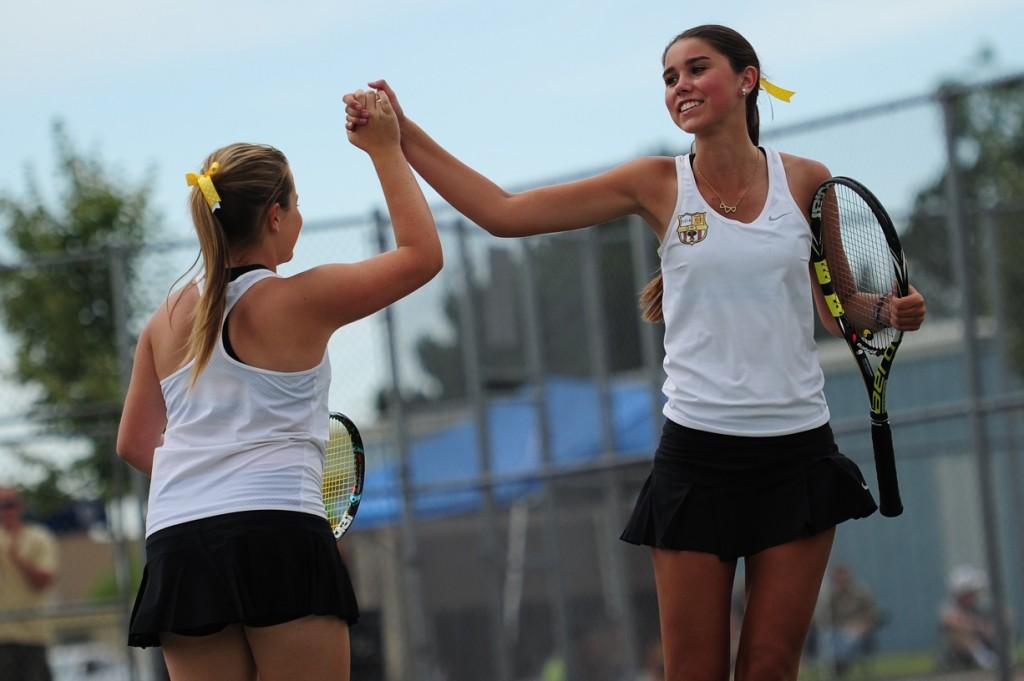 Girls tennis takes first state title in school history