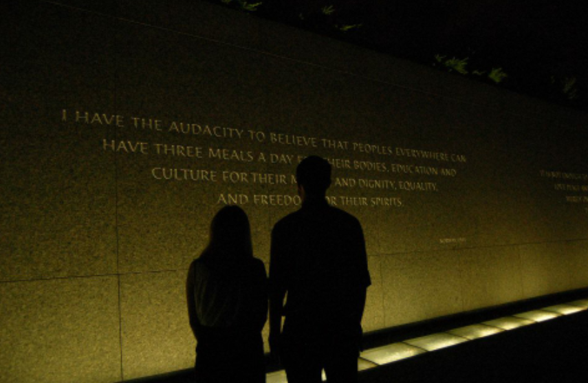 Aziza Cunningham, representative from Tennessee, and me reading quotes by Martin Luther King, Jr. engraved in the granite wall surrounding his monument in Washington, D.C. Photo by Camden Metheny, 2015 representative from Arkansas