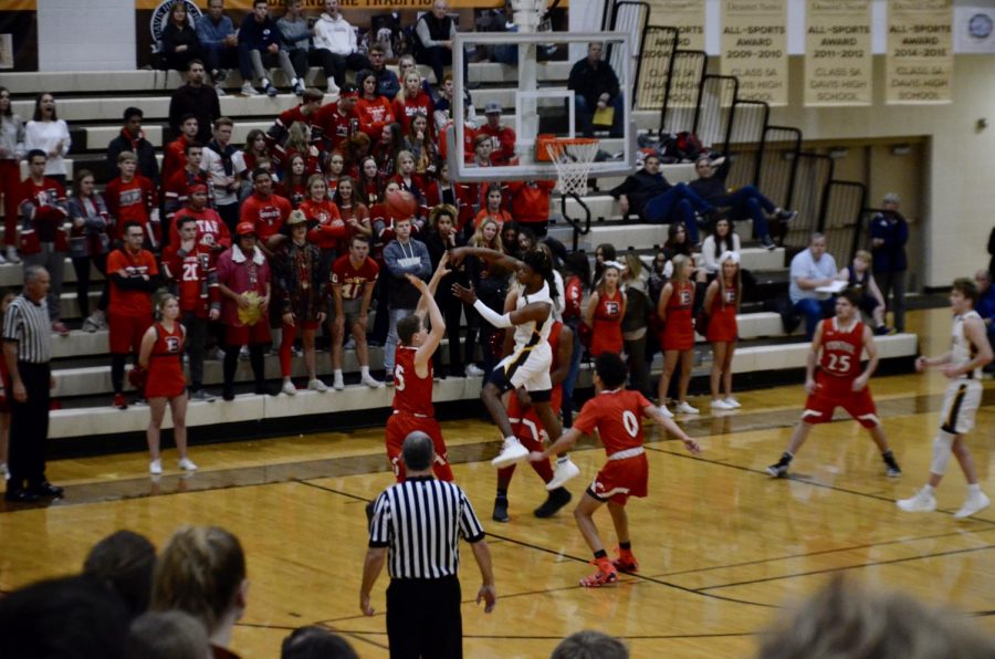 Darts Take on Warriors: Boys Basketball