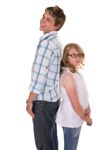 Teen and preteen. Measuring growth White background.Same guy: