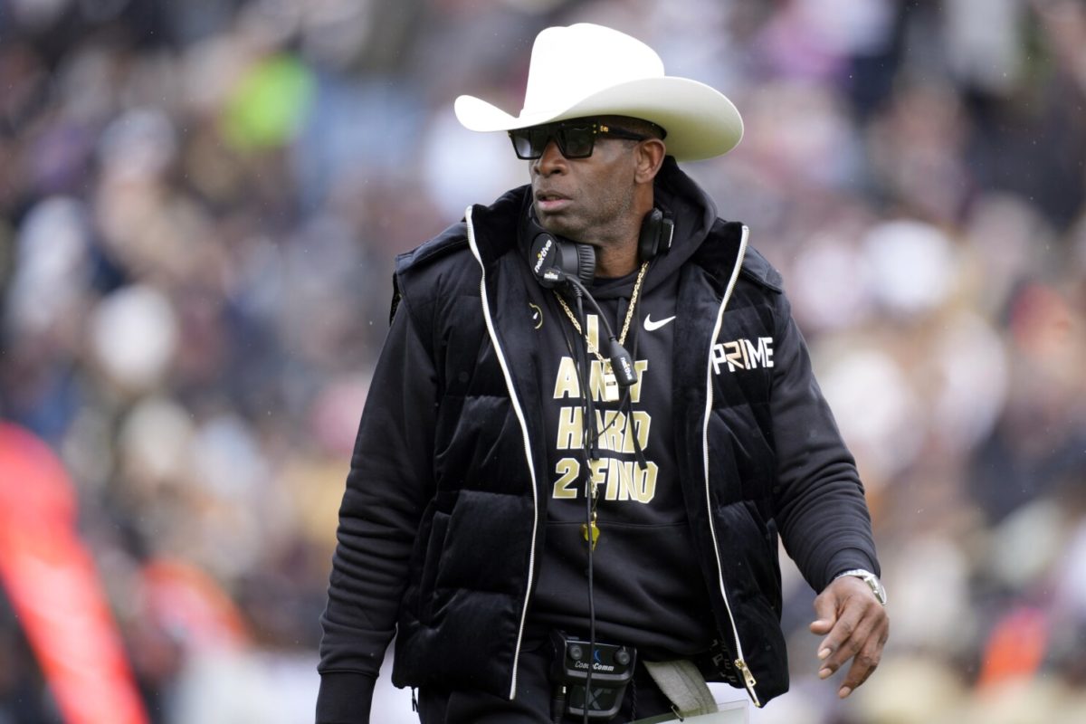 FILE - Colorado head coach Deion Sanders looks on in the first half of the teams spring practice NCAA college football game, April 22, 2023, in Boulder, Colo. Colorado opens their season at TCU on Sept. 2.  (AP Photo/David Zalubowski, File)